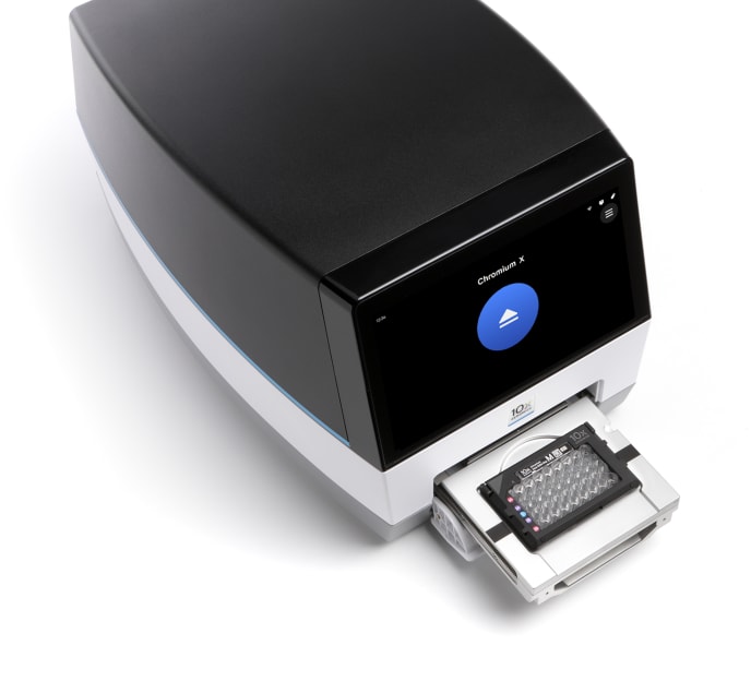 Chromium X/iX instrument, right-facing angle, with tray open to display loaded chip